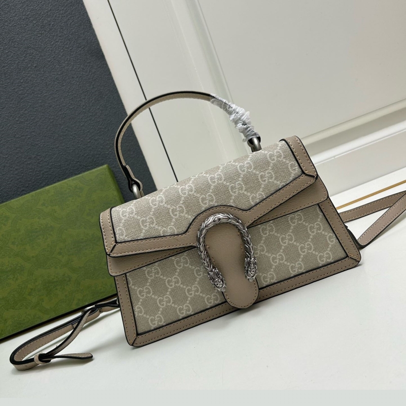G*u*i top handle bags
